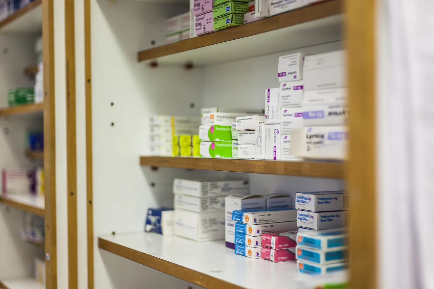 Pharmacy shelving stocked with pharmaceutical products in Mexico